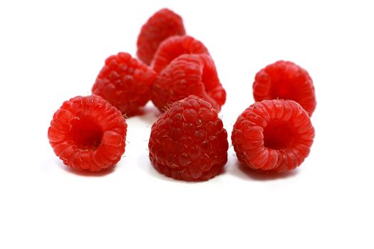 fresh juicy raspberry close up on white
