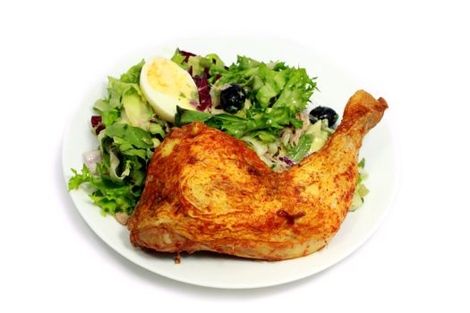 delicious fried chicken with salad and boiled egg