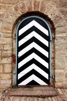 striped in black and white strategic door