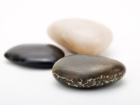 Spa stones on a white background