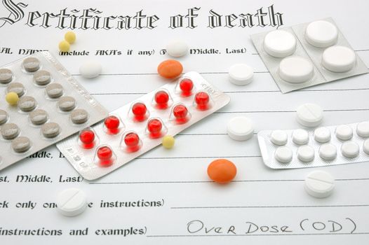 Certificate of death with cause of death "Overdose" and many pills (drugs).