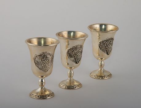 Wine-glasses cast from metal