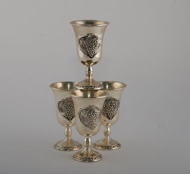Wine-glasses cast from metal