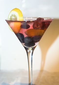 martini lemon olive and berries