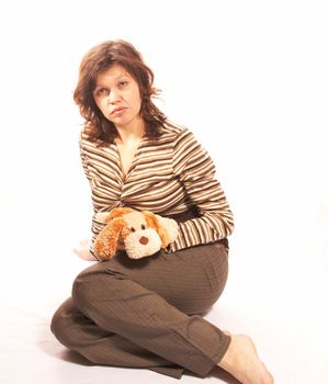 The girl in a striped jacket on a white background