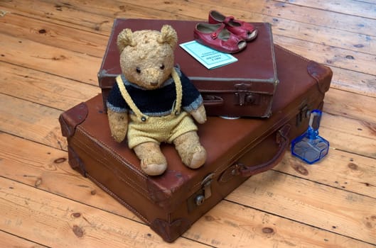 Suitcases, a Teddy Bear and travel accessories from the 1940s