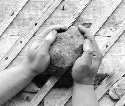 To put a corner stone. hands, black&wait