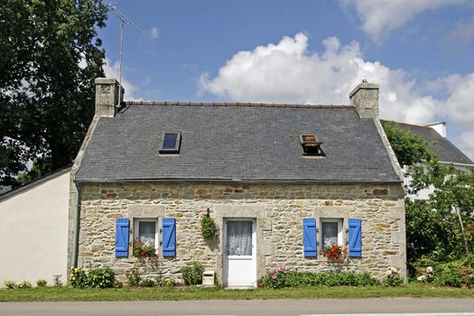 Bretonic house with blue windows near Combrit, Brittany, North France