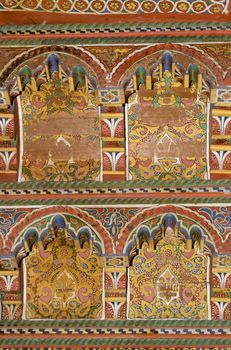 Ornate painted woodwork in the 19th century El Bahia Palace in Marrakesh, Morocco.