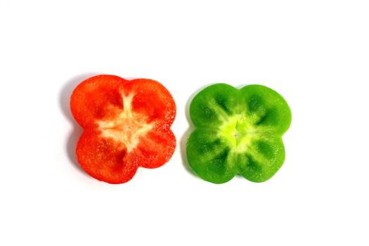 cut green and red peppers in the shape fo flowres isolated