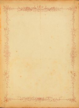 Photo of old stained yellowed paper from the 1920s with a floral border design.
