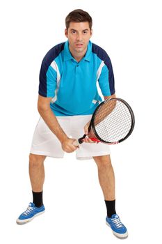 Photo of a young man playing tennis over white background.