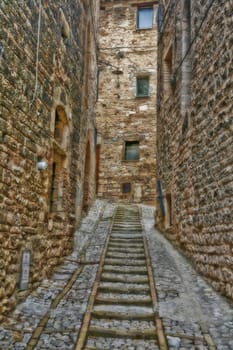 Steep alley, Spello, Umbria, Italy - soft focus.