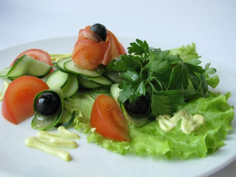 The Greek salad on a white plate