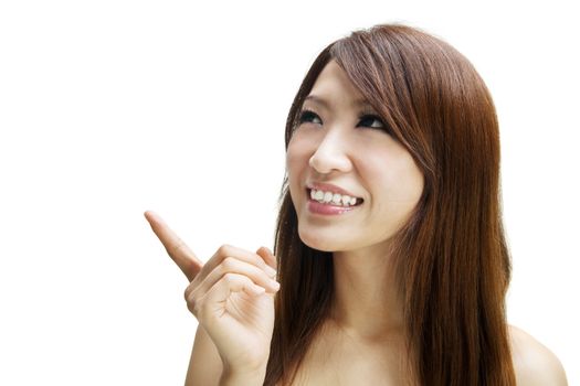 Asian woman pointing to empty space, ready for text.