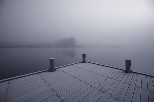 A frosty, foggy winter morning at the waterfront of Nyborg, Denmark.