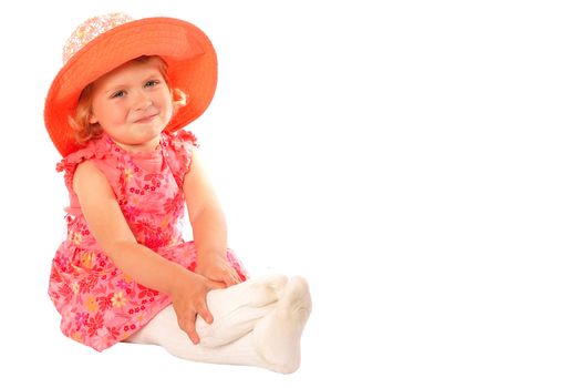 Little Girl Sitting in Stocking and a Hat