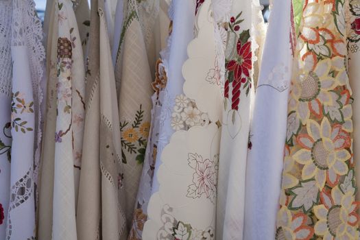  Handmade tableclothes for sale at a Croatian market place.