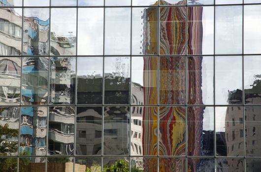 Reflctions in glass facade - La Defense, Paris.