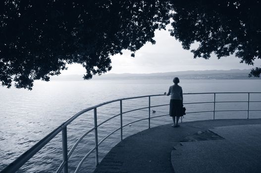 Female enjoying the view - Opatija, Croatia. Duotone.