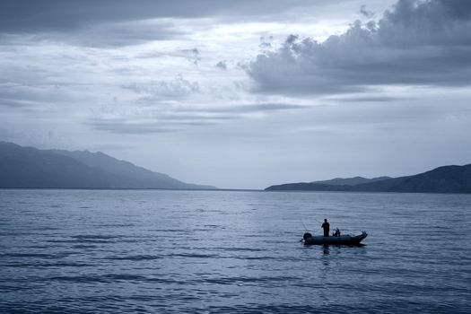 Early morning fishing - Croatia. Duotone.