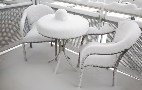 Morning at the balcony after a night with heavy snowing.