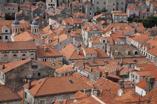 Roofs of Dubrovnik, Croatia seen from the town wall. Most of the tile was renewed after the war in 1991 as a great part of the roofs were damaged by artillery fire.