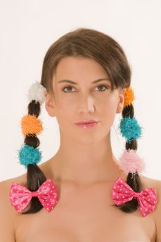 Portrait of a young girl with colorful braids