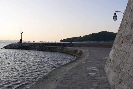 Early September morning by the entrance of the harbour of  Dubrovnik - Croatia.