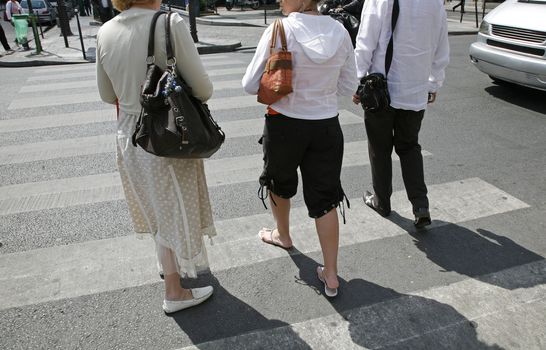 Pedestrians in crosswalk - Paris, France. 