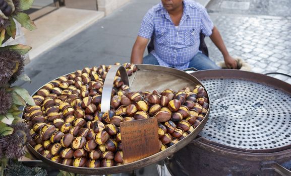 Tastful roasted chestnuts for sale - Rome, Italy.