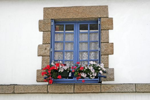 Blue window in Guidel, Brittany, North France.