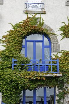 Larmor-Plage, balkony with blue window, Brittany, North France