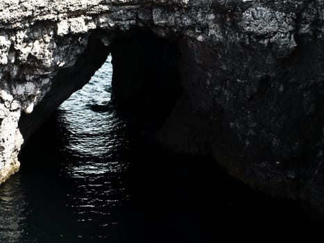 One of the many caves around the coast in Malta