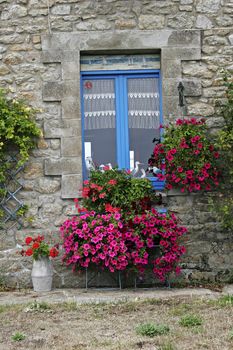 House with blue window near Plouharnel, Morbihan, Brittany, North France.