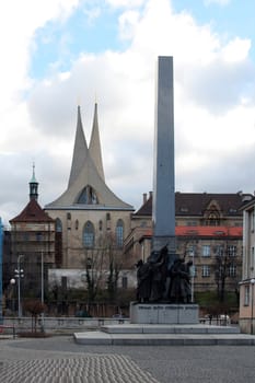 Monastery with the towers reminding sails and a monument