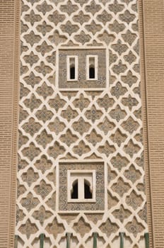 Islamic pattern on the side of a minaret in the town of Taroudannt in Morocco