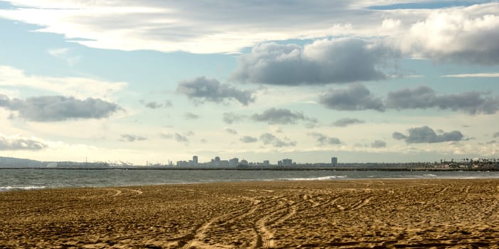 Dark clouds over Sunset Beach. Long Beach City in the background