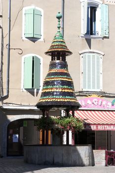 The fountain of Anduze which has the characteristic to have tiles of colors.