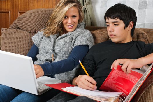 Photo of two students doing homework together.