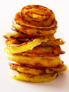 close up of a stack of onion rings