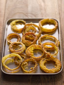 close up of a tray of onion rings