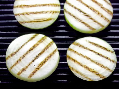 close up of grilled onion slices