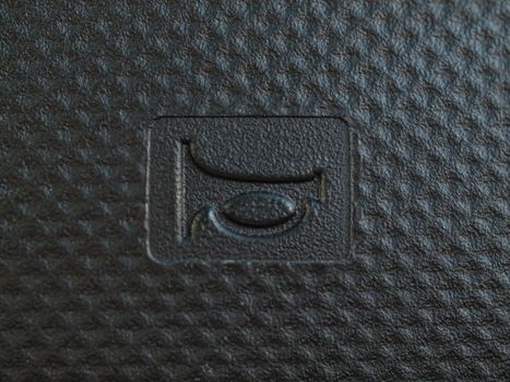 macro of a horn symbol  inside a car