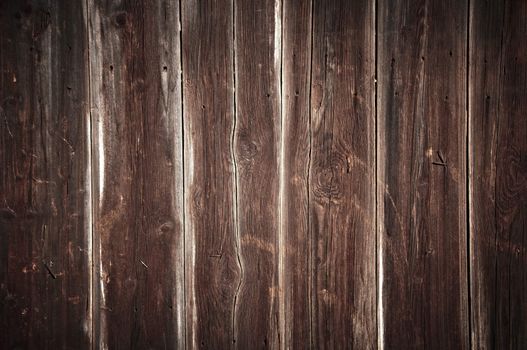 Old brown wooden wall texture background, with natural patterns