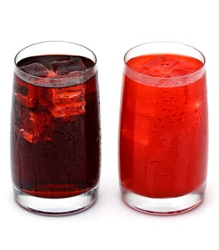two glass of cold juice with ice on white background