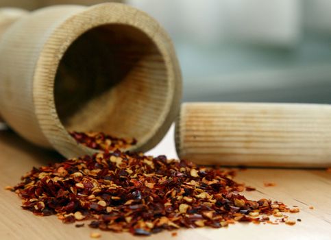 Hot chilli pepper close up with pestle