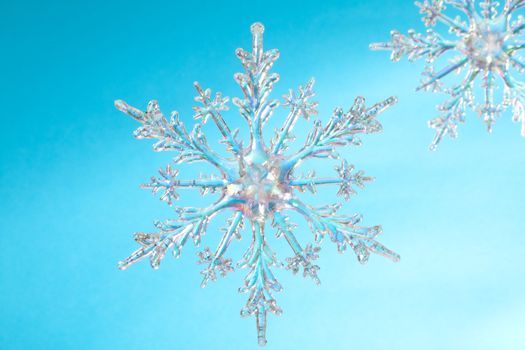 Snowflake shape, photo on the blue background