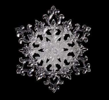 Snowflake shape, photo on the black background
