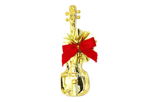 Golden christmas guitar  and red ribbon on a white background 